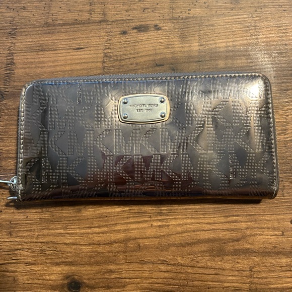 Michael Kors Handbags - Michael Kors jet set metallic rare large zip around wallet wristlet